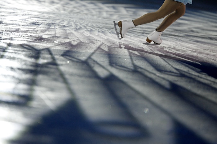 female ice skater on the ice skating